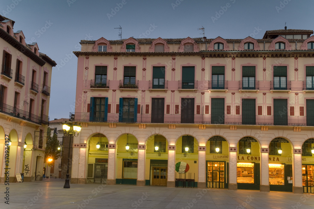 Buildings in Lopez Allue square at sunset.