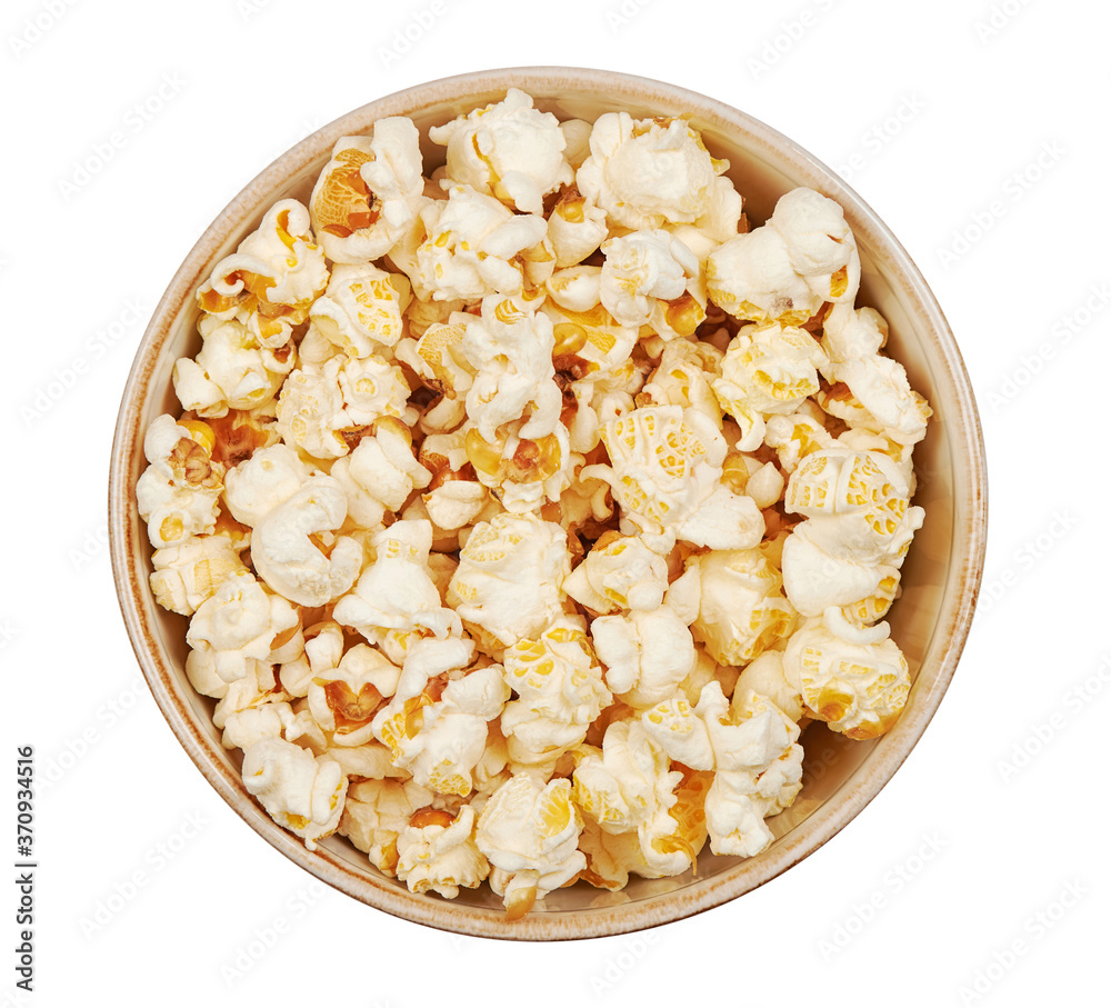 Popcorn in a bowl viewed from above. Isolated on white Popcorn in a bowl viewed from above. Isolated on white