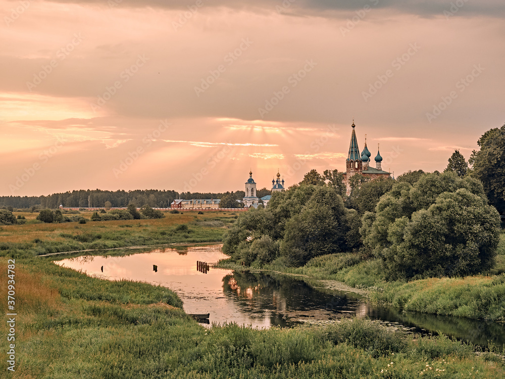 church by the river. summer landscape in the  village
