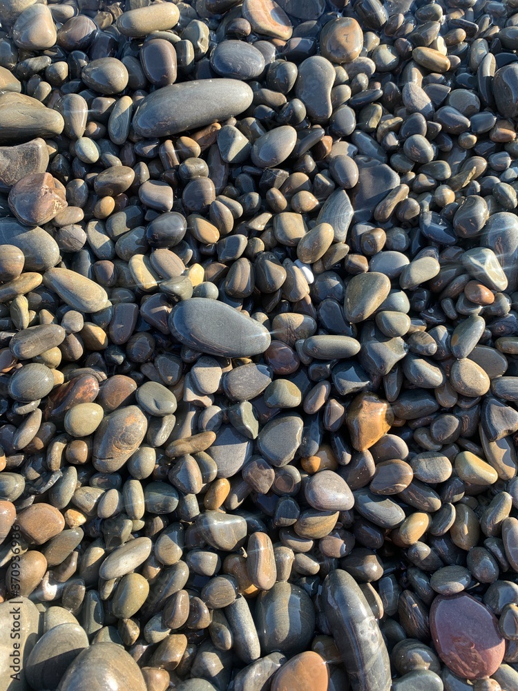 Pebble stones background, beach, natural colors Pebble stones background, beach, natural colors