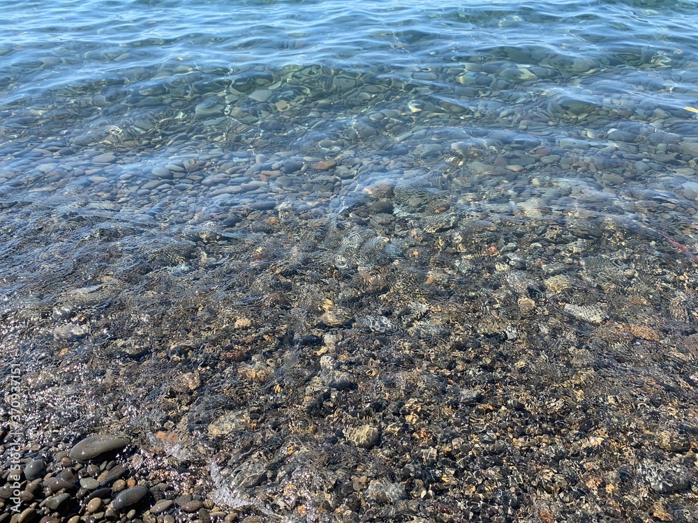 Pebble stones background, beach, natural colors Pebble stones background, beach, natural colors