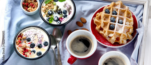 Yogurt breakfast bowls with granola and fruits