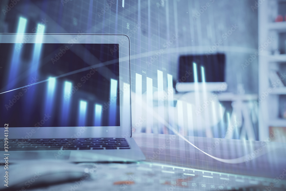 Forex Chart hologram on table with computer background. Multi exposure. Concept of financial markets.