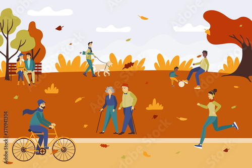 Cute happy men and women in the park. People relaxing in nature in a beautiful autumn park.