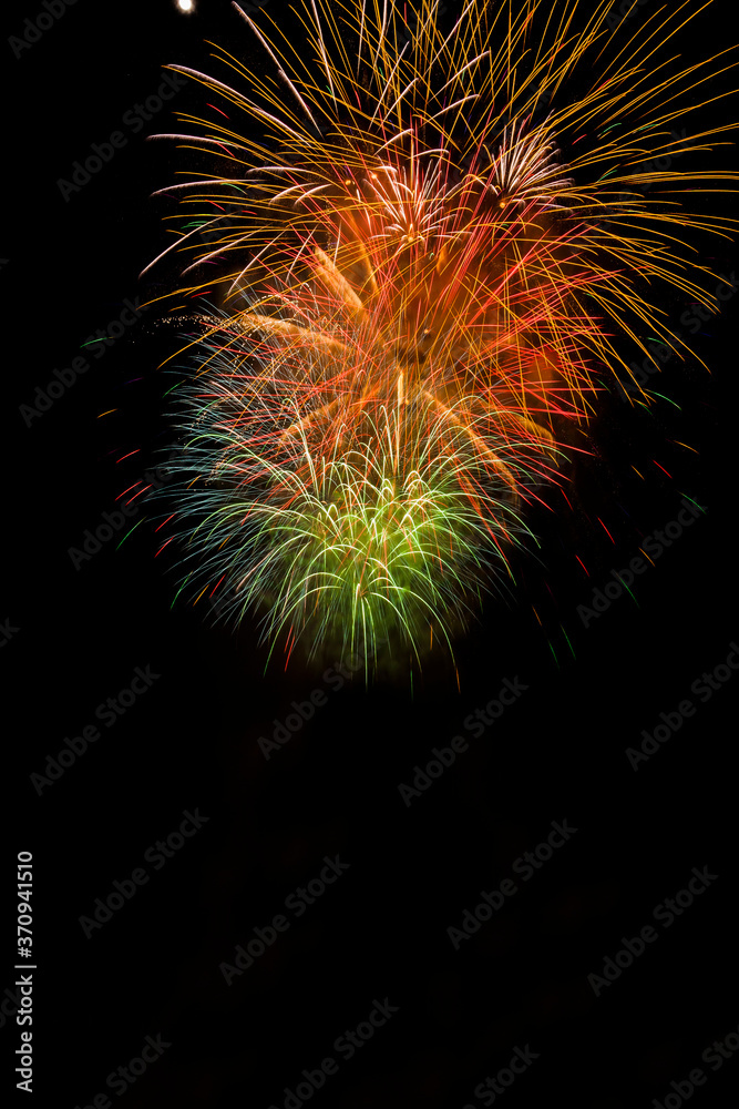 Fototapeta premium Close-up of colorful fireworks in black background