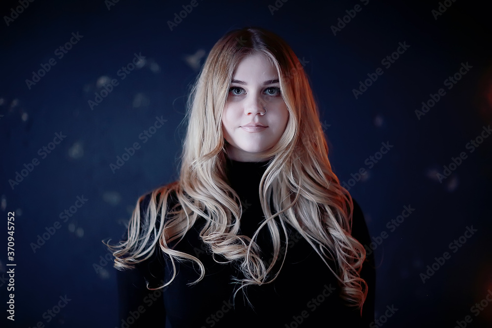 winter blonde / young adult model, blonde with long beautiful hair posing in the winter season