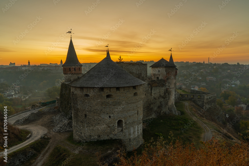 medieval castle or stronghold silhouette and beautiful sunset
