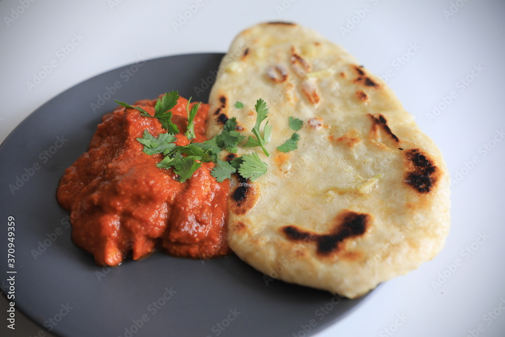 Butter chicken and garlic naan Butter chicken and garlic naan