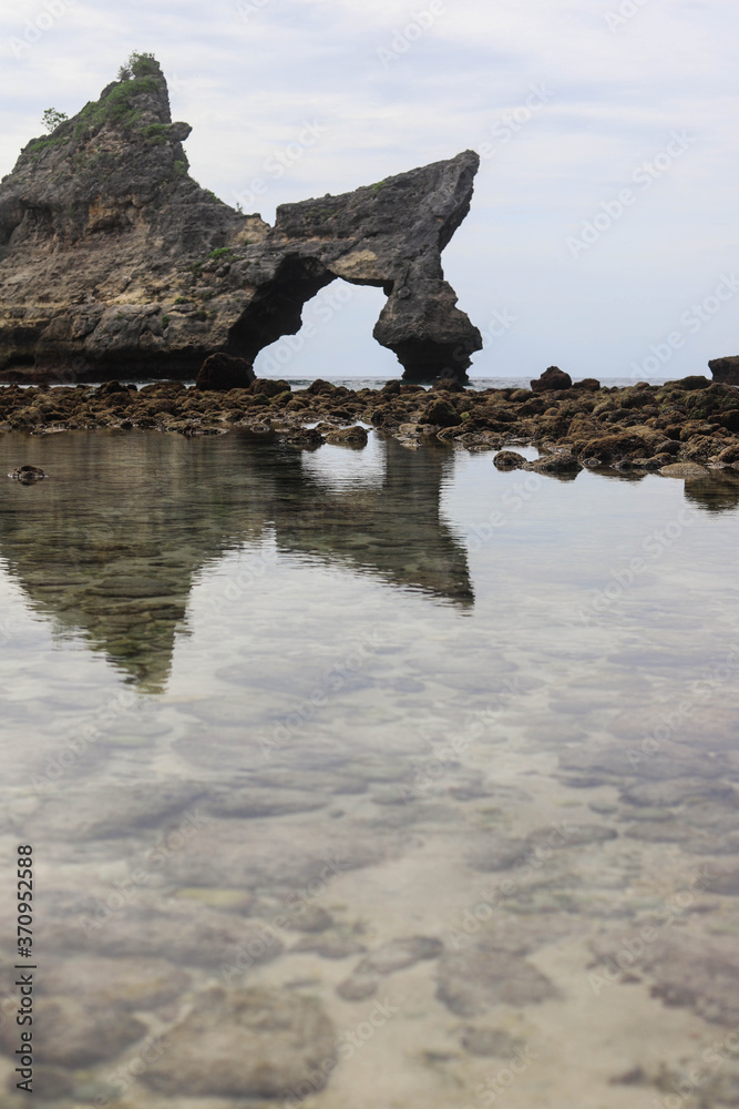 Atuh Beach on Nusa Penida Island, Bali, Indonesia. Amazing  view with rocky mountains and azure lagoon with clear water of Indian Ocean 