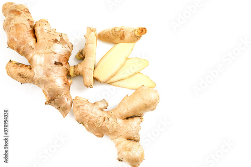 Foto Ginger is a flowering plant whose rhizome, ginger root or ginger, is widely used as a spice and a folk medicine