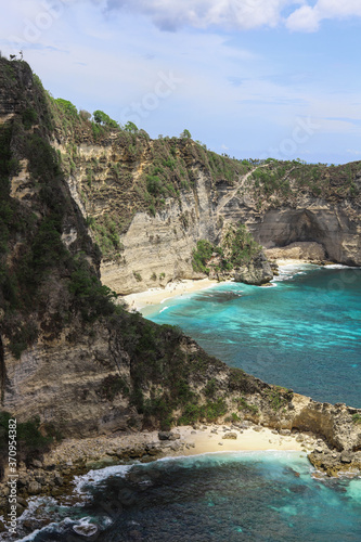 The beautiful Diamond Beach on Nusa Penida Island  Bali  Indonesia. Amazing  view  white sand beach with rocky mountains and azure lagoon with clear water of Indian Ocean 