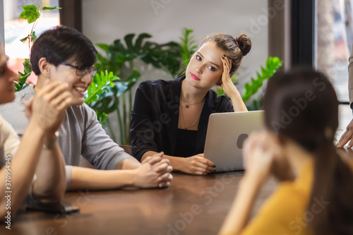 close up businesswoman listen carefully to discussion manager talking in meeting work room planning. women meeting teamwork.