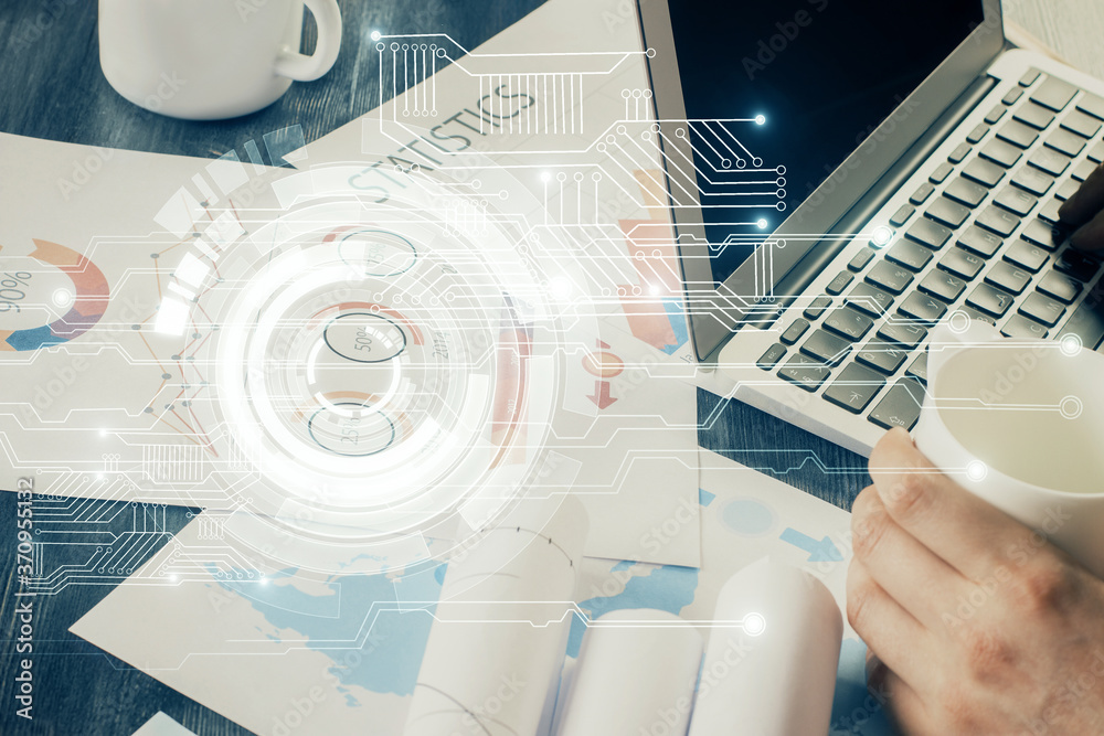 Multi exposure of technology hologram with man working on computer background. Concept of big data. Multi exposure of technology hologram with man working on computer background. Concept of big data.