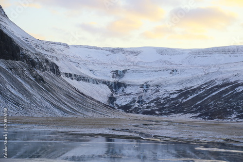 Frozen waterfall in Sudavik Iceland photo