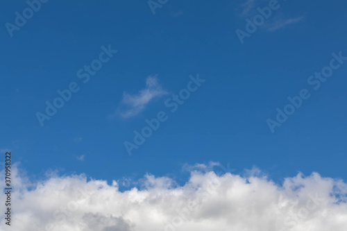 Canvas Print background banner blue sky and white dense clouds at the bottom of the frame