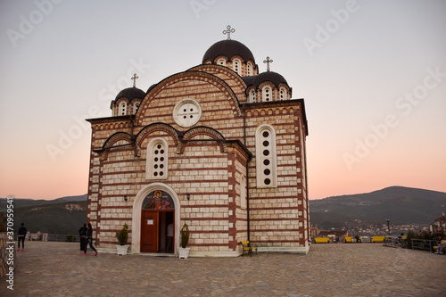 Orthodox church on hill in Serbian part of Mitrovica during sunset