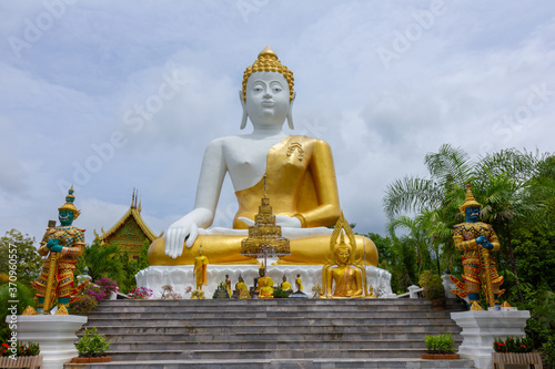 Big Buddha at  Wat Phra That Doi Kham, Chiang Mai, Thailand  © rbk365