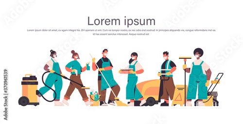 mix race cleaners in masks disinfecting coronavirus cells to prevent covid-19 pandemic cleaning service disinfection control of epidemic concept horizontal full length copy space vector illustration