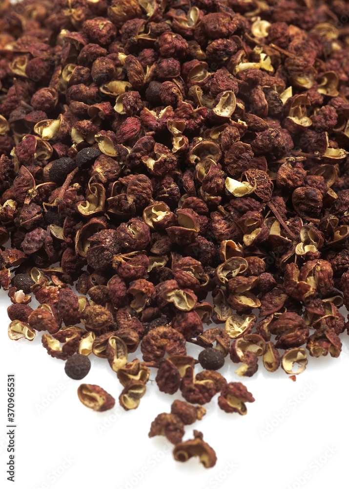 Szechuan or Sichuan Pepper, zanthoxylum simulans, Berries against White Background Szechuan or Sichuan Pepper, zanthoxylum simulans, Berries against White Background