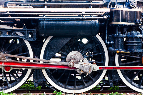 Steam Train car wheels closeup photo