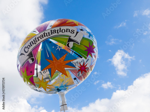 Congratulations to your new citizenship! Colorful balloon greeting.