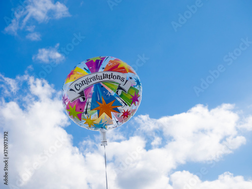 Congratulations for passing the exams! Balloon flying high