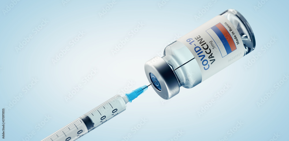 Russian COVID-19 Coronavirus Vaccine and Syringe Concept Image. Russian COVID-19 Coronavirus Vaccine and Syringe Concept Image.