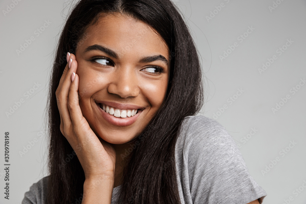 Portrait of a happy smiling young african woman