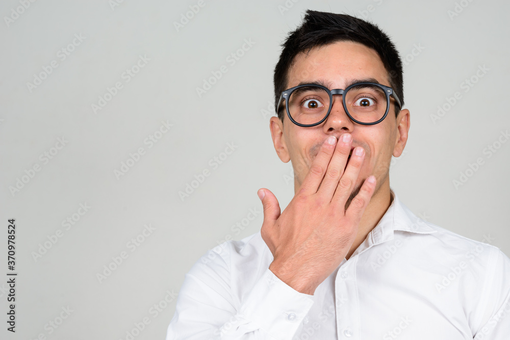 Portrait of handsome businessman against white background Portrait of handsome businessman against white background
