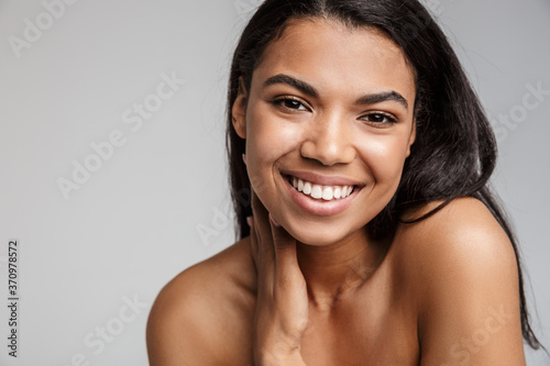 Portrait of a beautiful young sensual topless african woman