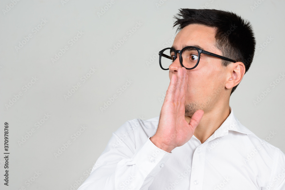 Portrait of handsome businessman against white background Portrait of handsome businessman against white background