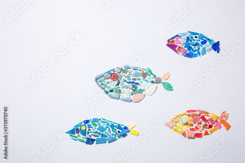 Fishes made of microplastics photo