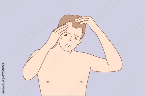 Health, care, frustration, examination, irritation concept. Young frustrated sad upset man guy with alopecia cartoon character looking at mirror examining head. Age problem of hair loss illustration.