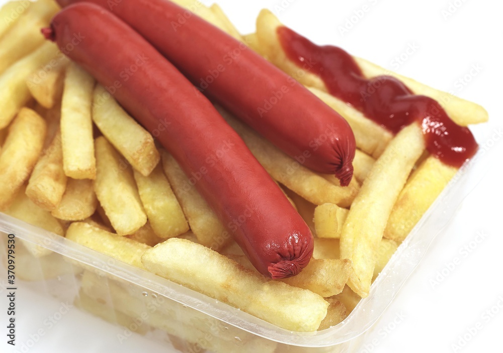 Sausages and French Fries with Ketchup against White Background