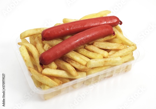 Sausages and French Fries against White Background