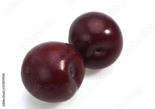 Red Plums, Fruits against White Background