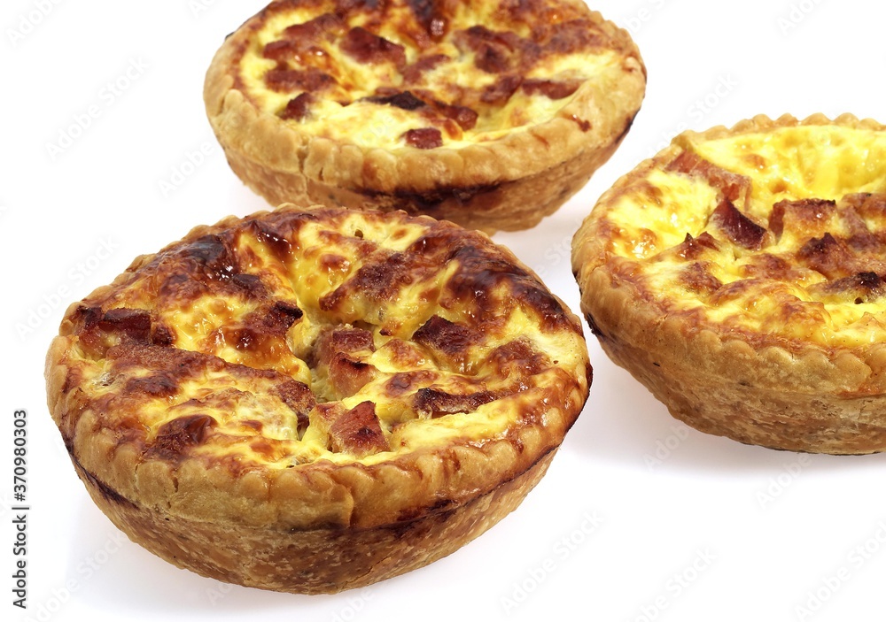 French Lorraine Quiche against White Background French Lorraine Quiche against White Background