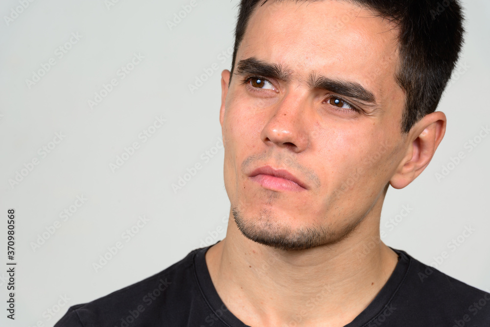 Portrait of handsome man against white background Portrait of handsome man against white background