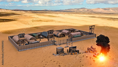 Military compound in the middle east, aerial view of a military base. Kamikaze attack. Explosion of a vehicle. Guard towers and reinforced concrete fence in defense of terrorist attacks, 3d render