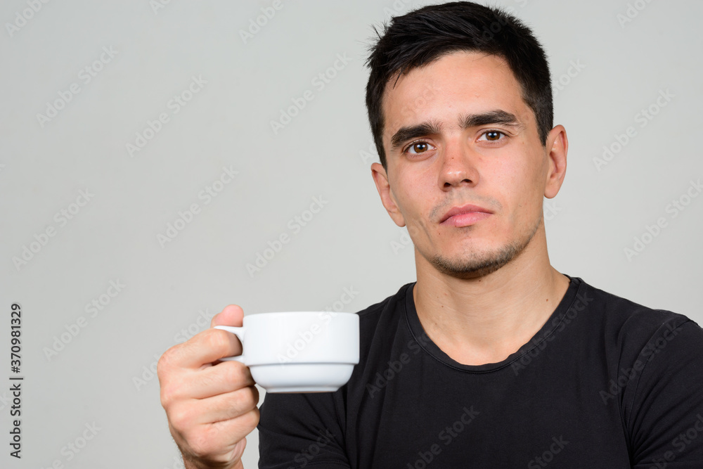Portrait of handsome man against white background Portrait of handsome man against white background
