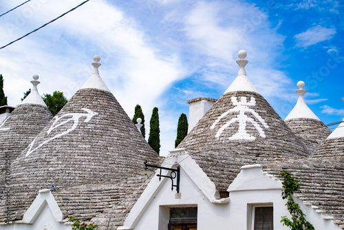 South of the Italy, alberobello with blue sky in background and the trulli in foreground
