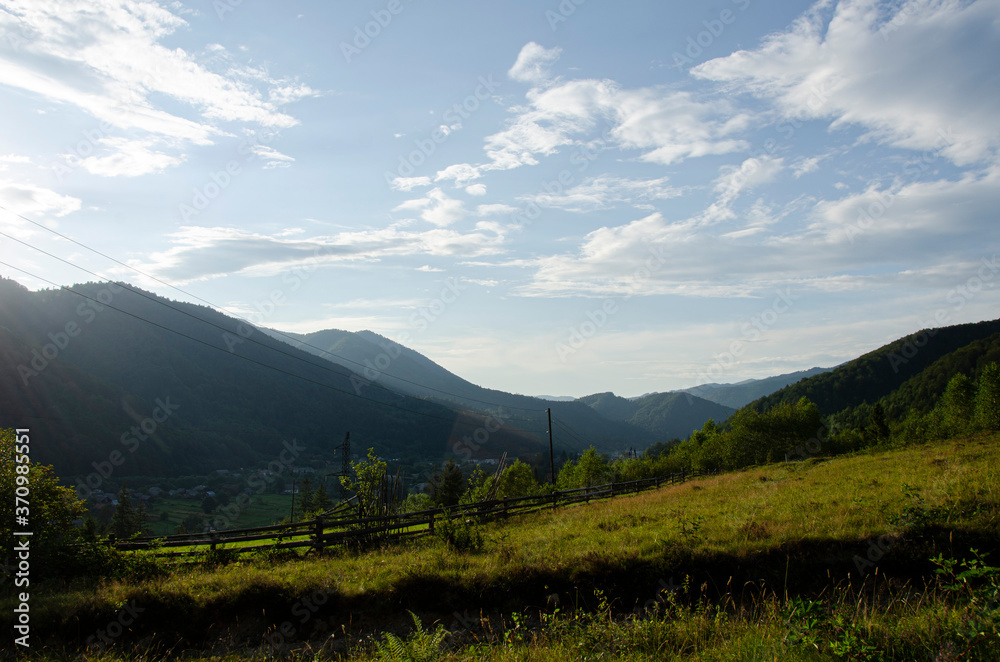 Fototapeta premium Sunny panorama view in the Carpathian mountains, Ukraine