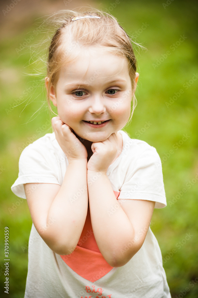Portrait of emotional baby girl in summer Portrait of emotional baby girl in summer