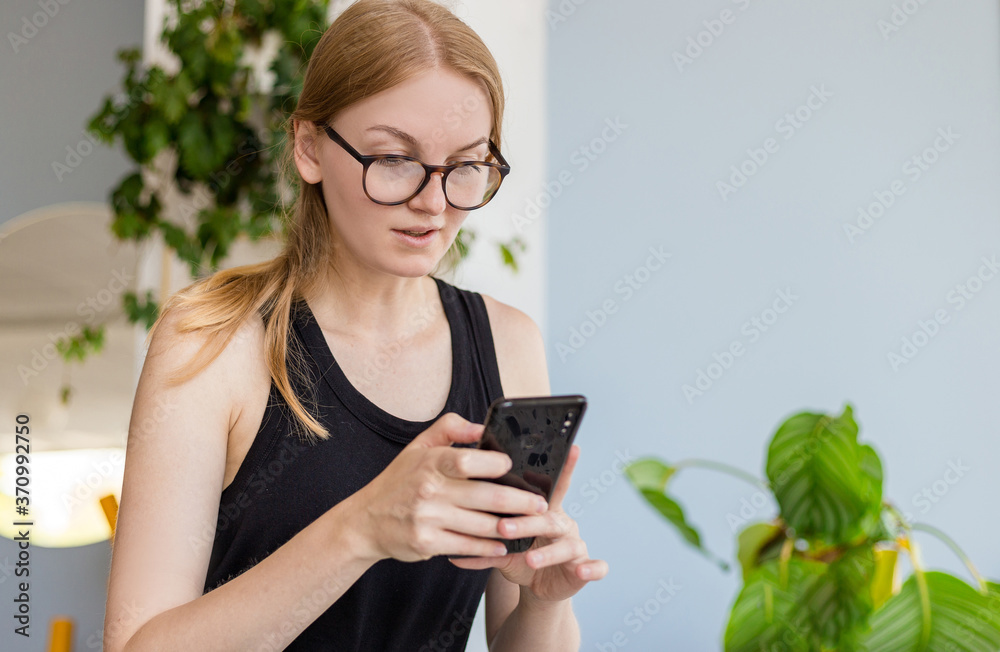 Beautiful woman in cafe using mobile phone and texting in social networks, Female freelancer, Active life concept. Summer lifestyle. Beautiful woman in cafe using mobile phone and texting in social networks, Female freelancer, Active life concept. Summer lifestyle.