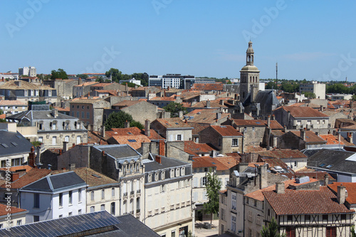 Rooftop view of the historic town of Niort and the tower of le Pilori. Niort is large town in the Deux-Sèvres department in western France with a population of 60,000+. photo