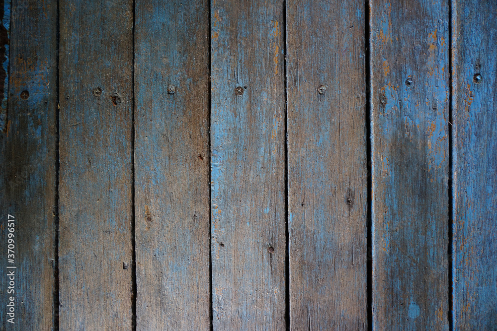Obraz premium Wooden floor blue color the construction dirty background with daylight on the floor