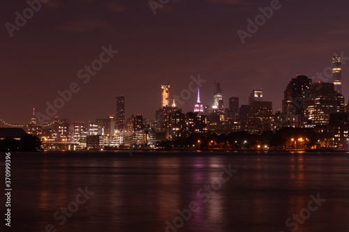 Nighttime Roosevelt Island and Manhattan Skyline along the East River in New York City © James