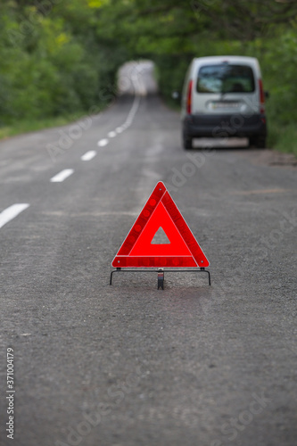  red triangle on a rural road