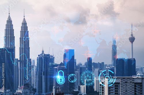 Photography World planet Earth map hologram over panorama city view of Kuala Lumpur, Malaysia, Asia