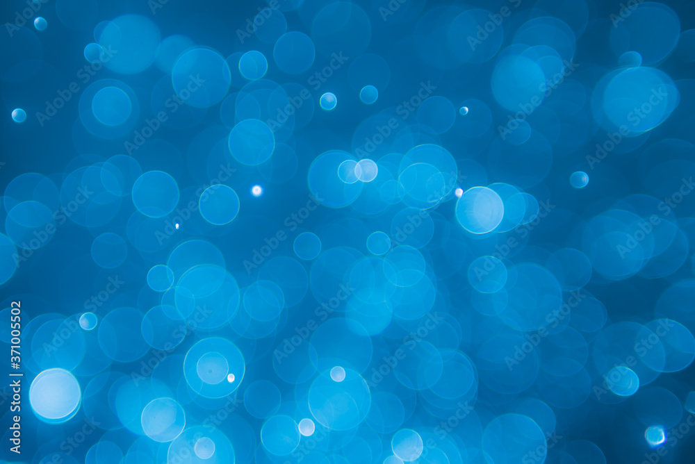 abstract light bokeh with navy blue background abstract light bokeh with navy blue background